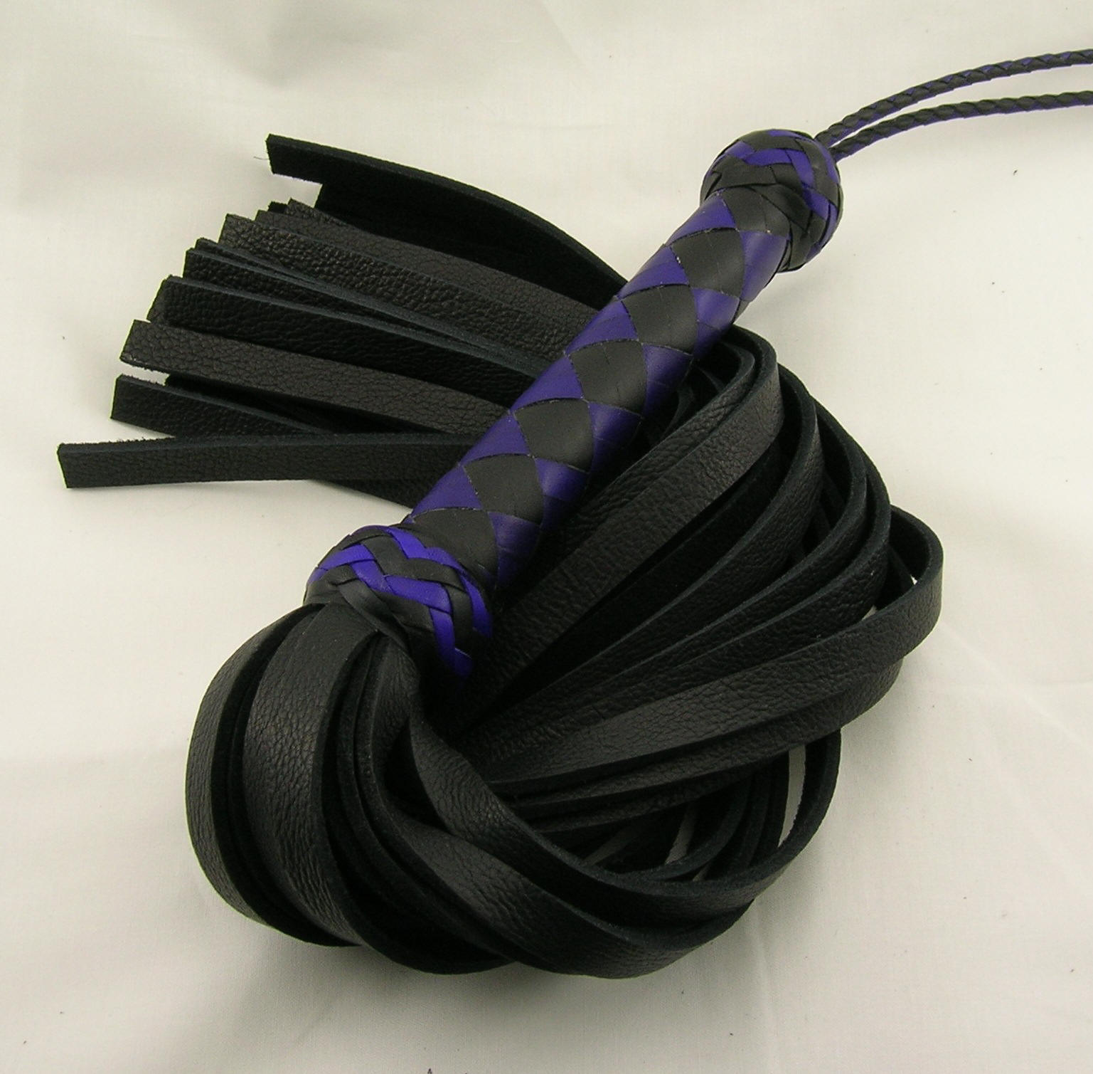 Purple bullhide Flogger